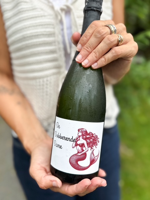 Drank arrangement dobberende dame